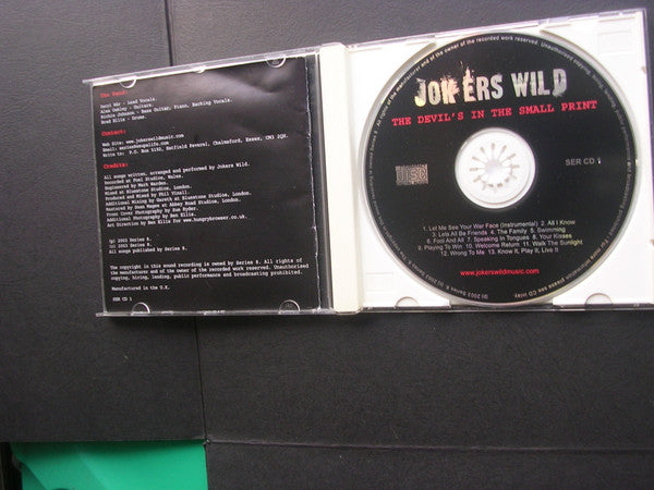 Jokers Wild (10) : The Devil's In The Small Print (CD, Album)