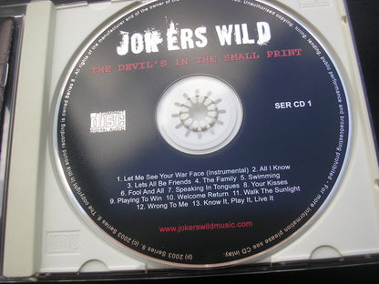 Jokers Wild (10) : The Devil's In The Small Print (CD, Album)