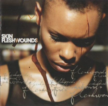 Skin : Fleshwounds (CD, Album, RE)